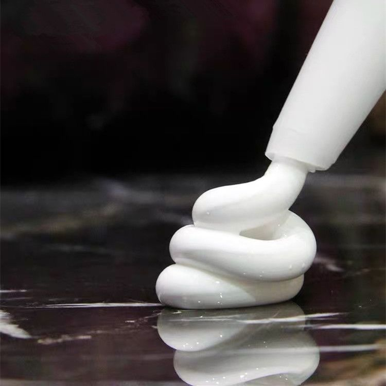 White silicone sealant being applied for waterproof surface protection