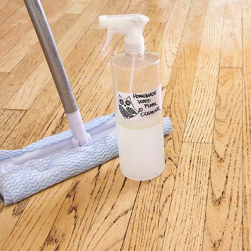 Homemade wood floor cleaner spray with mop on hardwood