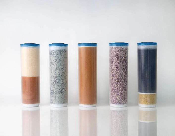 Different water filter cartridges with various filtration media types